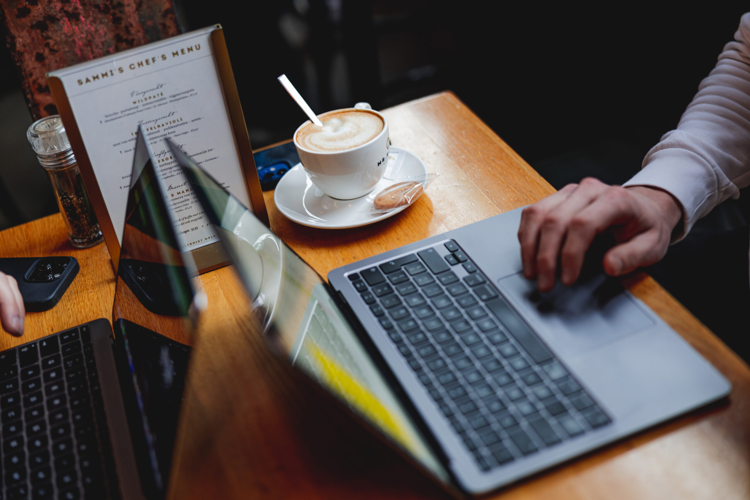 Person working at a laptop.